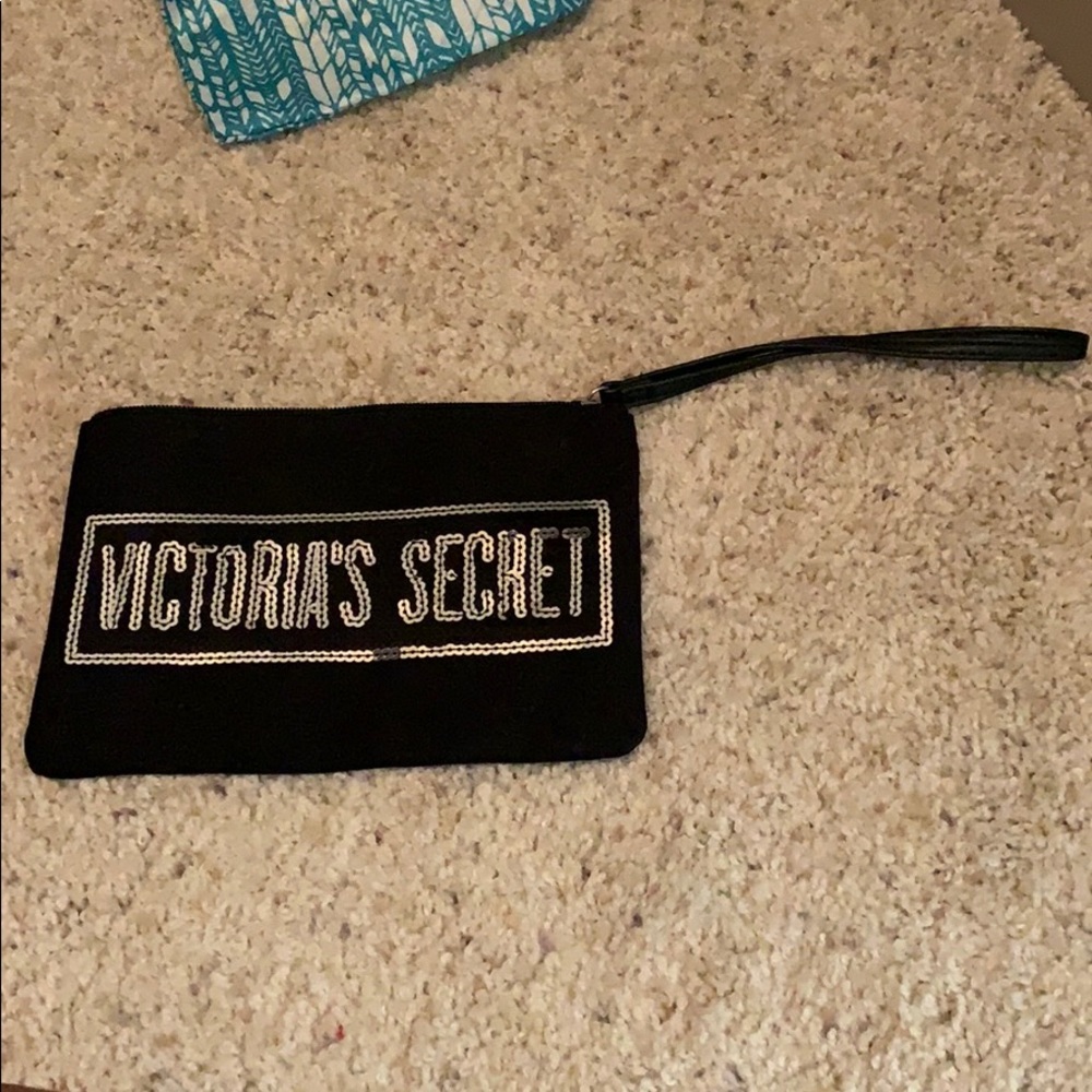Victoria’s Secret cloth and sequined clutch.